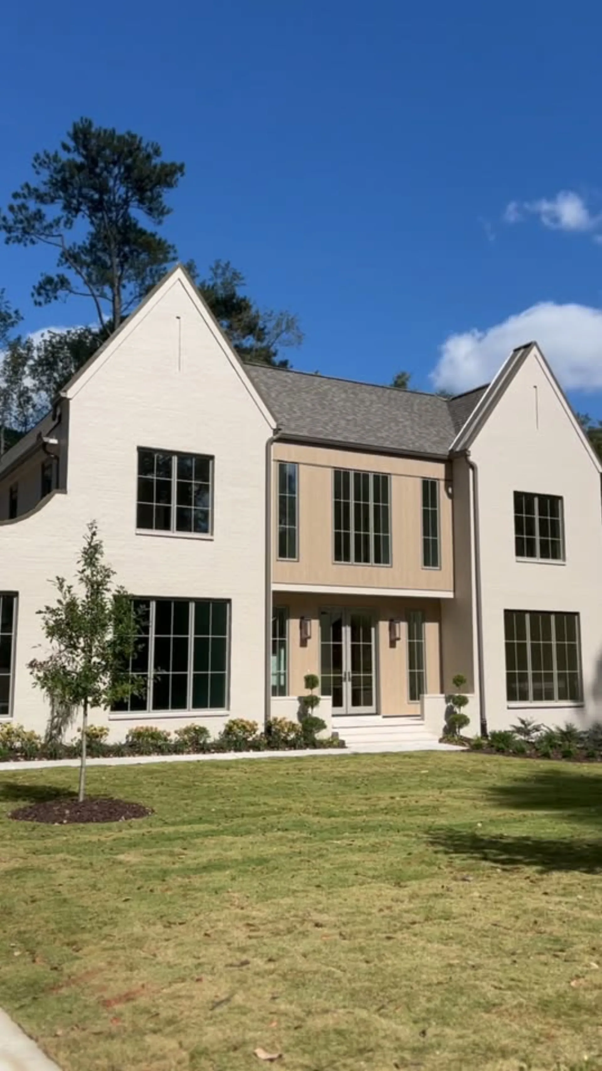 Luxury white painted brick home by OVO Painting in Atlanta