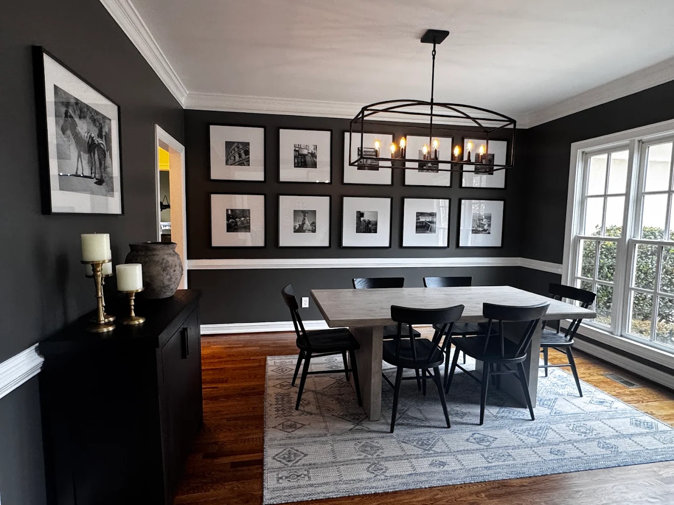Dramatic black walls in dining room